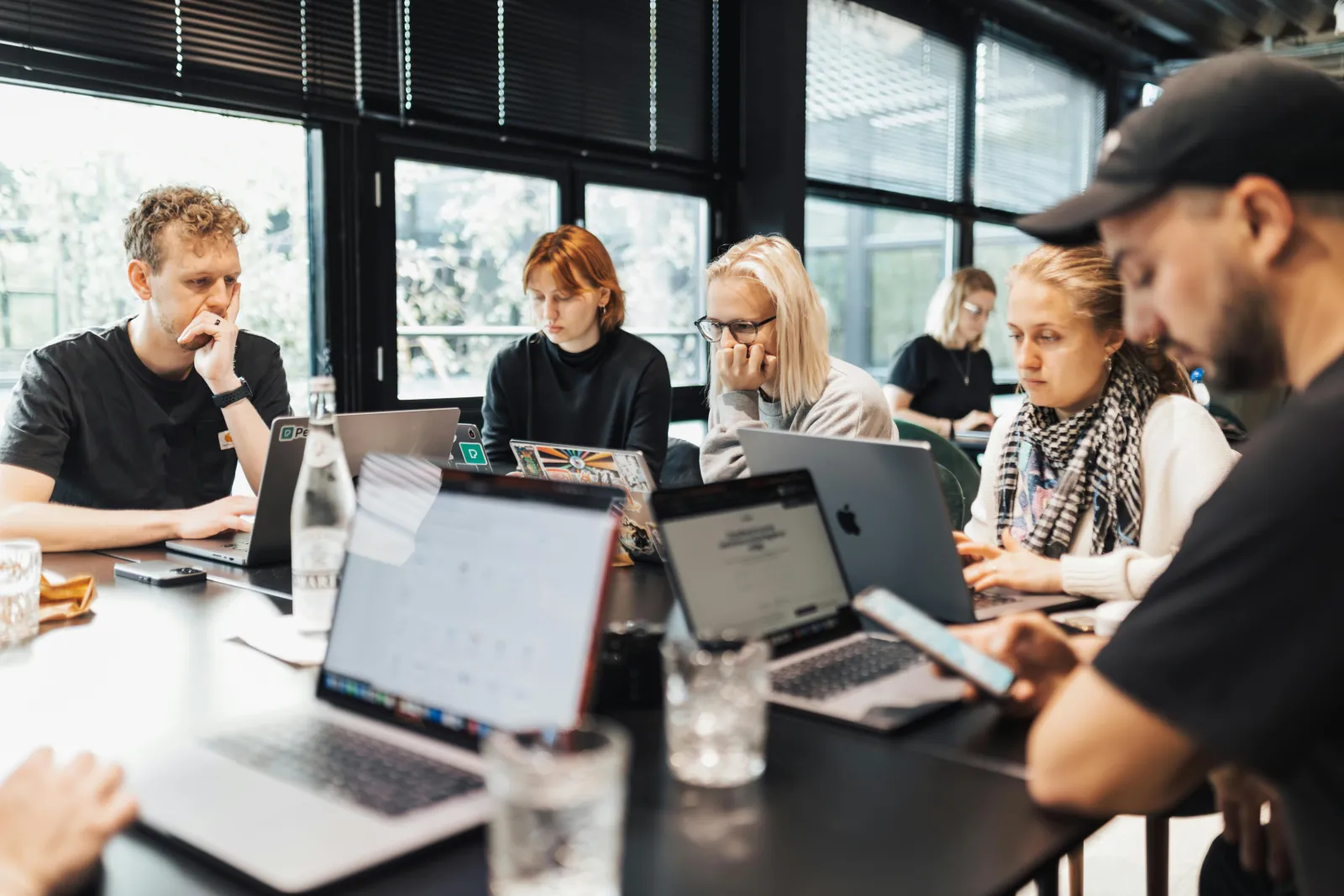 Team collaborating in a cybersecurity training workshop